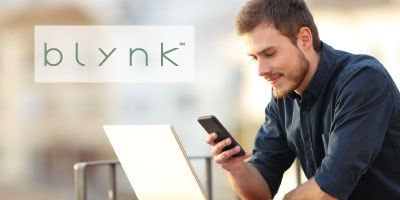 blynk by Apex Capital | man on phone and laptop